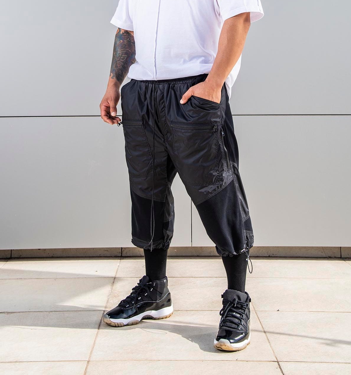 Men’s Casual Athletic Harem Shorts with Washed Distressed Motif